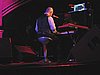 40 Thomas Dolby and his reflection on the piano.JPG